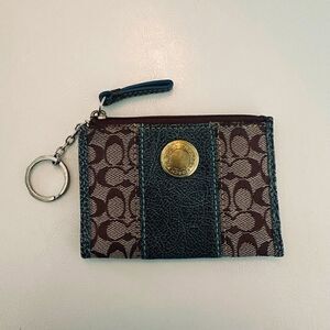 Coach brown signature card holder wristlet.